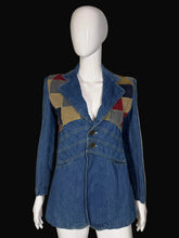Load image into Gallery viewer, Blue denim jacket with patchwork shoulders on a mannequi
