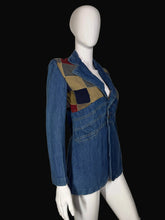 Load image into Gallery viewer, Blue denim jacket with patchwork shoulders on a mannequi
