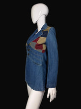 Load image into Gallery viewer, Blue denim jacket with patchwork shoulders on a mannequi
