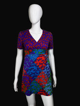 Load image into Gallery viewer, Colorful patterned dress on a mannequin
