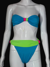 Load image into Gallery viewer, Neon blue and green bikini set on a mannequin
