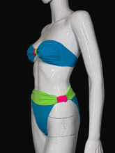 Load image into Gallery viewer, Neon blue and green bikini set on a mannequin

