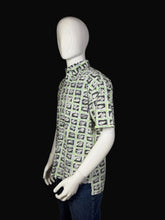 Load image into Gallery viewer, Short sleeve button up with 1980's geometric scribble print on a mannequin
