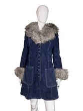 Load image into Gallery viewer, Blue jacket with gray fur trim on a mannequin against a white wall.
