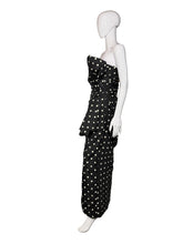 Load image into Gallery viewer, Black polka dot dress on a mannequin.
