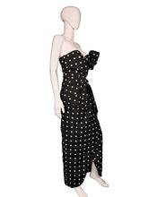Load image into Gallery viewer, Black polka dot dress on a mannequin.
