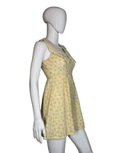 Load image into Gallery viewer, Yellow floral dress on a mannequin 
