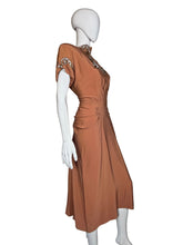 Load image into Gallery viewer, Orange dress on a mannequin
