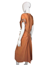 Load image into Gallery viewer, Orange dress on a mannequin
