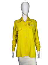 Load image into Gallery viewer, Yellow shirt with cat and flower design on a mannequin 
