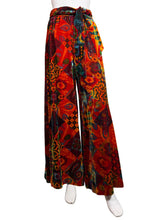 Load image into Gallery viewer, Colorful patterned pants on a mannequin against a white background
