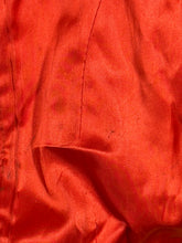 Load image into Gallery viewer, Close-up of red fabric with visible spots
