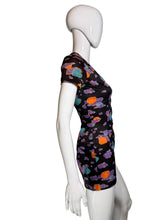 Load image into Gallery viewer, A short-sleeve black romper with a colorful abstract cloud pattern in purple, orange, and teal, displayed on a white mannequin.
