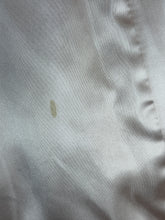 Load image into Gallery viewer, Close-up of a small spot on the lining.
