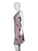 Load image into Gallery viewer, Lavender dress with a bird print on a mannequin against a plain background
