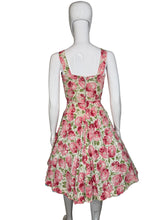 Load image into Gallery viewer, Floral dress on a mannequin against a neutral background
