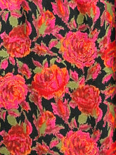 Load image into Gallery viewer, A close-up of a floral fabric pattern featuring large pink and red roses with green leaves on a black background.
