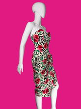 Load image into Gallery viewer, A strapless bodycon dress with a mixed animal print and floral pattern, displayed on a white mannequin.
