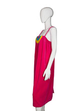 Load image into Gallery viewer, Mannequin wearing a pink dress with colorful accents on a white wall.
