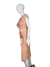 Load image into Gallery viewer, Mannequin wearing a peach-colored dress on a white surface
