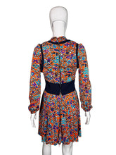 Load image into Gallery viewer, Colorful floral dress on a mannequin against a white background
