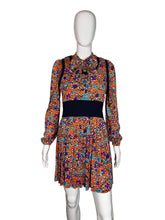 Load image into Gallery viewer, Colorful floral dress on a mannequin against a white background
