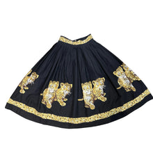 Load image into Gallery viewer, Black skirt with leopard cub print on a white background
