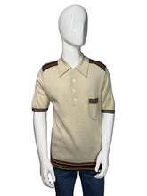 Load image into Gallery viewer, Beige sweater with striped sleeves on a mannequin against a white background
