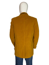 Load image into Gallery viewer, Mustard yellow jacket on a mannequin against a white background
