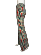 Load image into Gallery viewer, Plaid bell-bottom pants on mannequin against a plain background
