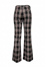 Load image into Gallery viewer, Black and white plaid pants on a mannequin against a plain background
