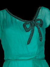 Load image into Gallery viewer, A teal Helen Rose midi dress with a ribbon detail at the collar displayed on a white mannequin.
