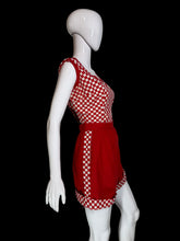 Load image into Gallery viewer, Red and white 1950's checkered sleeveless two piece set with shorts and a cropped tank top displayed on a white mannequin.
