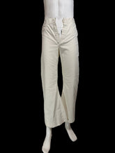 Load image into Gallery viewer, Off-white wide-leg cropped pants displayed on a white mannequin, featuring a button fly.
