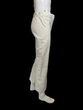 Load image into Gallery viewer, Off-white high-waisted trousers displayed on a white mannequin
