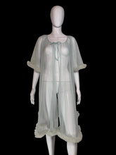 Load image into Gallery viewer, A sheer, light blue tulle mesh robe with swiss dots all over, a tie-neck detail and ruffled trim, displayed on a white mannequin.
