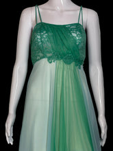 Load image into Gallery viewer, A close-up of a two-tone green sheer mesh nightgown with a lace bodice and thin spaghetti straps, displayed on a white mannequin.
