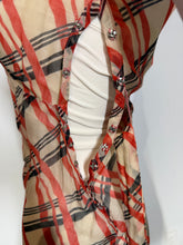 Load image into Gallery viewer, A close up of the side snap closure on a  1930's cream dress with red and black diagonal plaid. 
