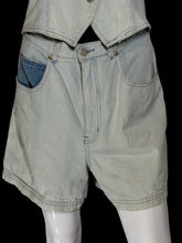 Load image into Gallery viewer, Light-wash striped denim shorts with a blue denim pocket insert on the left side, displayed on a white mannequin.
