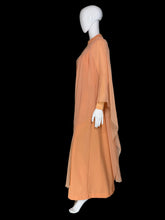 Load image into Gallery viewer, An orange vintage maxi dress with sheer draping sleeves displayed on a white mannequin
