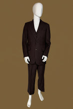Load image into Gallery viewer, A dark brown pinstripe suit displayed on a white mannequin, featuring a two-piece jacket and trousers with a matching vest.
