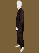 Load image into Gallery viewer, A dark brown pinstripe suit displayed on a white mannequin, featuring a two-piece jacket and trousers with a matching vest.
