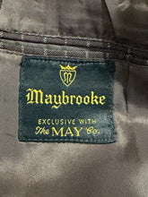 Load image into Gallery viewer, Close-up of a dark green embroidered brand label reading 'Maybrooke' with gold lettering and a crown logo, sewn onto a gray satin-like garment interior.
