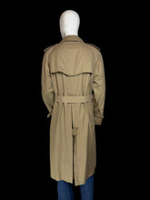 Load image into Gallery viewer, The back view of a classic Burberry double-breasted trench coat in khaki beige, shown on a white mannequin. The coat features a belted waist, shoulder epaulets, and button closures.
