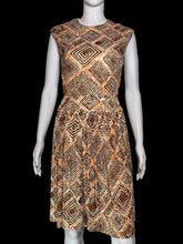 Load image into Gallery viewer, A sleeveless fit-and-flare dress with a geometric diamond pattern in orange, brown, and beige, displayed on a white mannequin.
