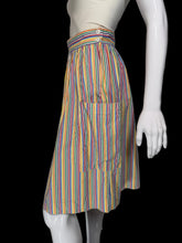 Load image into Gallery viewer, A vintage striped skirt shown on a white mannequin. The skirt features vertical stripes in yellow, blue, orange, and red on a white base, with side pockets.

