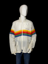 Load image into Gallery viewer, A white windbreaker jacket with a bold rainbow stripe across the chest and upper back, shown on a white mannequin.
