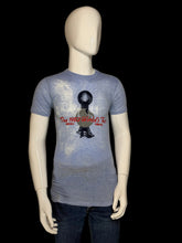 Load image into Gallery viewer, A mannequin wearing a faded light blue graphic t-shirt with a black and red 'The 1982 World's Fair' print
