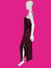 Load image into Gallery viewer, A sleeveless, floor-length burgundy sequined gown displayed on a white mannequin.
