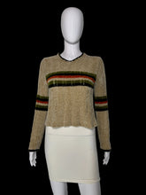Load image into Gallery viewer, A cropped knit sweater displayed on a white mannequin, featuring a beige body with horizontal stripes in green, orange, and black across the chest and on the sleeves.
